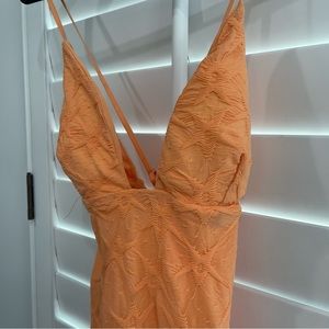 Fashion trend orange long dress.